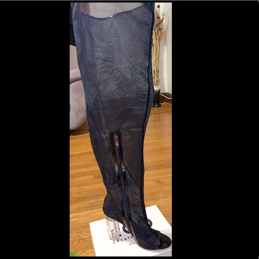 Long boots with perspex heel